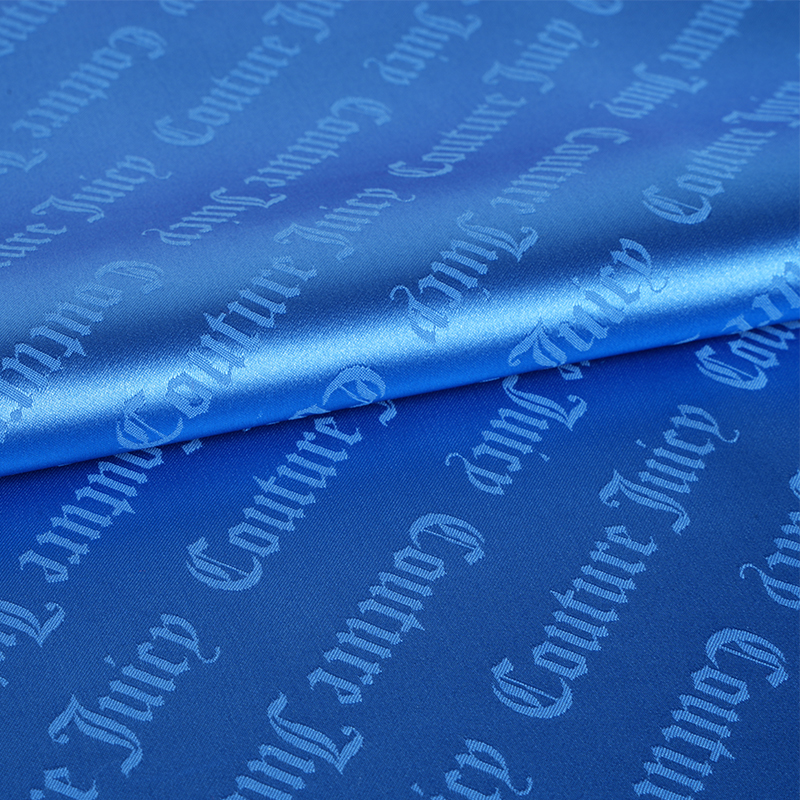 Kain Jacquard Huruf Satin Melar 75D